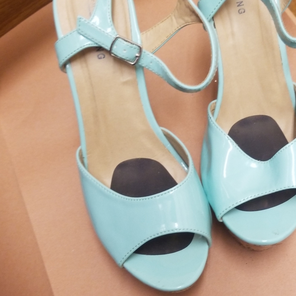 Size 10 gentle used  aqua colored wedge